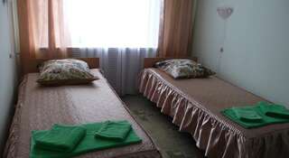 Гостиница Gostinica Garmnonia Plus Великие Луки Двухместный номер эконом-класса с 2 отдельными кроватями и телевизором-1